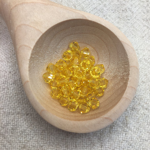 Prestige Crystal 4mm Bicone - Light Topaz