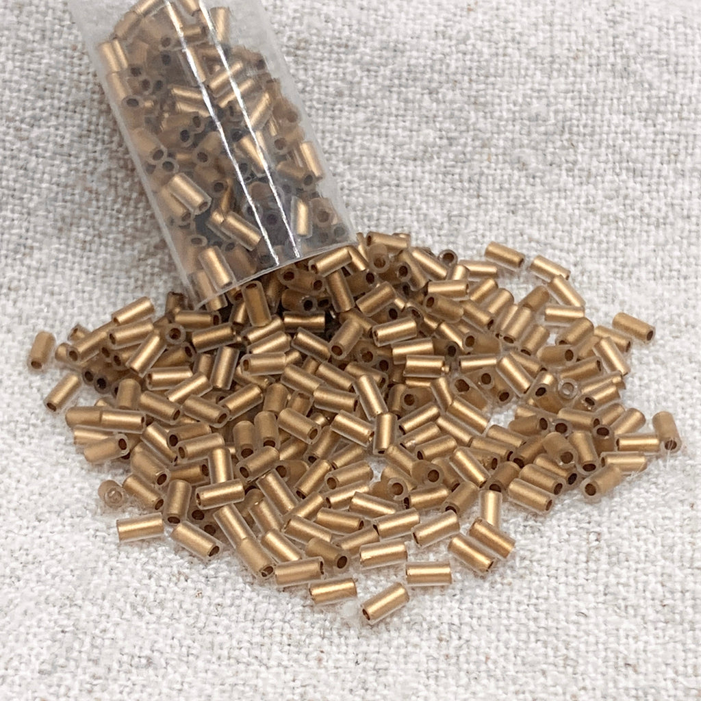 TOHO Bugle #1 3mm - Frosted Gold-Lined Crystal