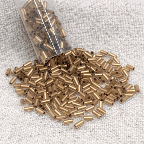 TOHO Bugle #1 3mm - Frosted Gold-Lined Crystal