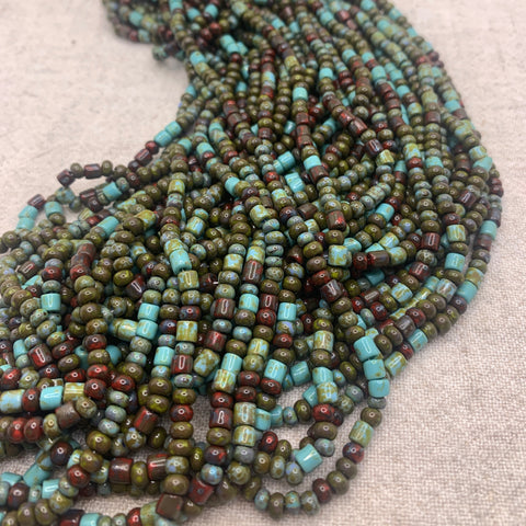 6/0 Aged Druid Bugle Picasso Mix Strand