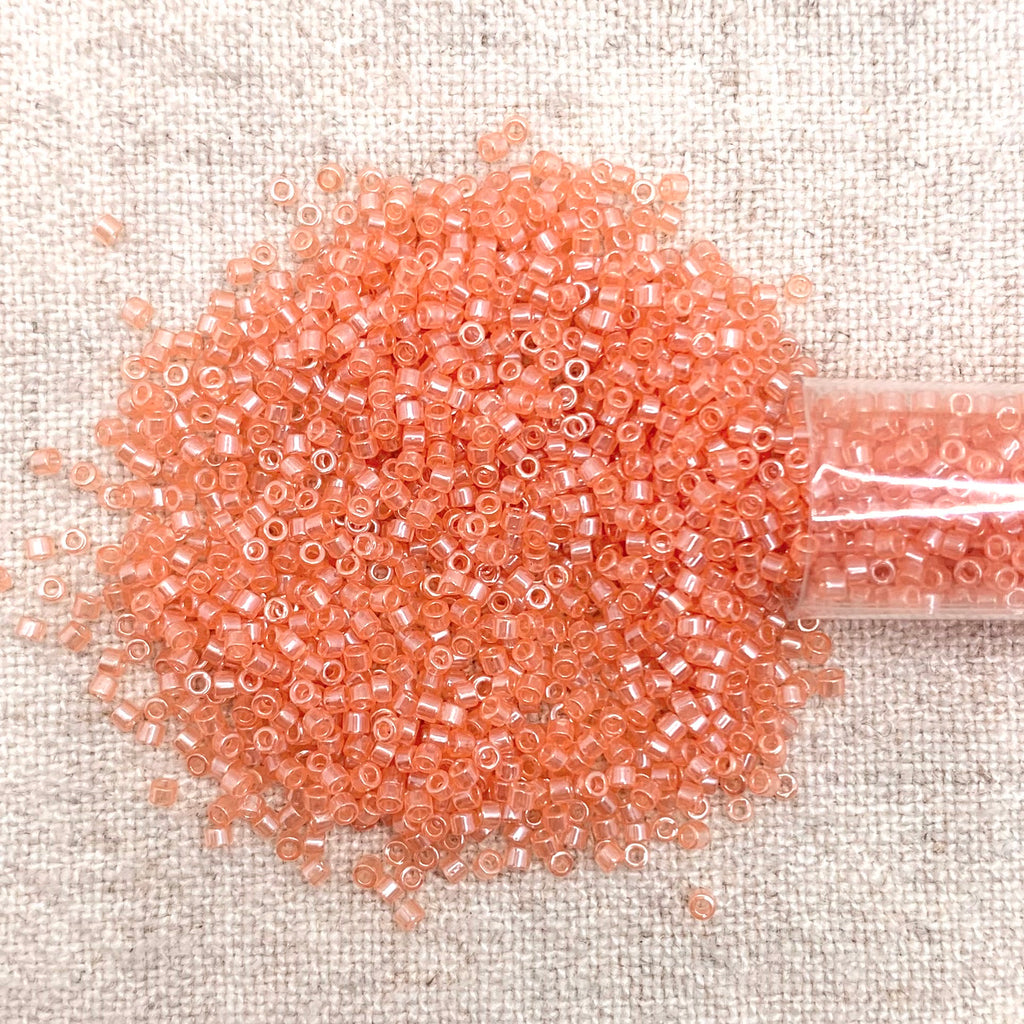 Delica 11/0 DB1480 Transp Peach Luster