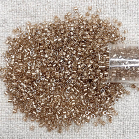 Delica 11/0 DB907 Sparkling Lt Bronze Lined Crystal