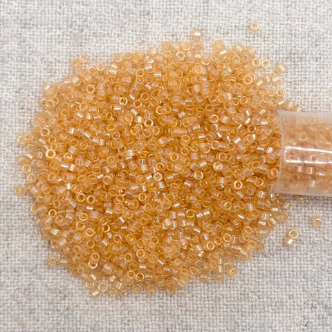 Delica 11/0 DB099 Transparent Lt Topaz Luster