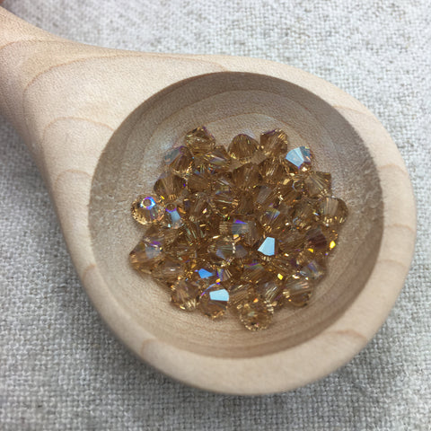Prestige Crystal 4mm Bicone - Lt Colorado Topaz Shimmer