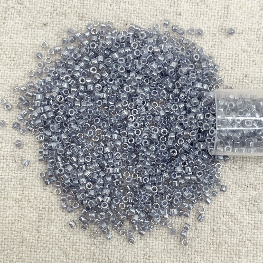 Delica 11/0 DB242 Lined Crystal / Gray